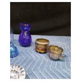 Blue glassware and 2 candlestick holders