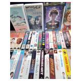 3 Suitcases full of 150 VHS tapes including 2 that have never been opened