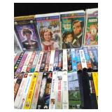 3 Suitcases full of 150 VHS tapes including 2 that have never been opened