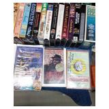 3 Suitcases full of 150 VHS tapes including 2 that have never been opened