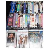 3 Suitcases full of 150 VHS tapes including 2 that have never been opened