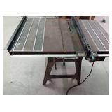 Craftsman metal table saw on wheels