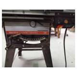 Craftsman metal table saw on wheels