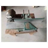 Shop Master planer mounted on stand with wheels