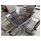 Glass top Patio Table with 4 swivel chairs