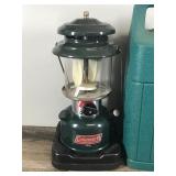2 - Coleman Lanterns with Cases - 1 is gas and the other is propane
