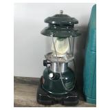 2 - Coleman Lanterns with Cases - 1 is gas and the other is propane