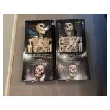 Two Pose-N-Stay Skeleton's with LED Eyes 60' Tall