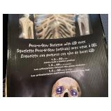 Two Pose-N-Stay Skeleton's with LED Eyes 60' Tall