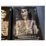 Two Pose-N-Stay Skeleton's with LED Eyes 60' Tall