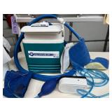 Breg Polar Care 300 unit with Multi-Use WrapOn pad and pump. This system circulates ice water to joints for easy pain and swelling relief. It