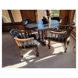 Slate Top Game Table with Four Rolling Armchairs