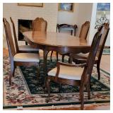 Elegant American Furniture Pecan Dining Table with Six Cane Back Chairs