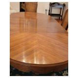 Elegant American Furniture Pecan Dining Table with Six Cane Back Chairs