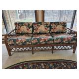 Rattan Frame Sofa with Floral Upholstery Cushions