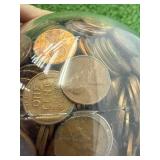 Round Bank Full of Pennies - Many Wheat