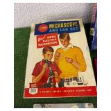 Sealed Rummikub Game, Gilbert Microscope Set & Puzzles
