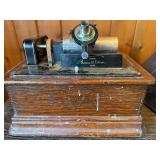 This antique is an Edison Standard Phonograph
