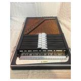 vintage Oscar Schmidt 36-chord autoharp Lightly if ever played.