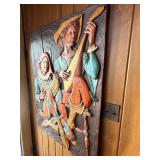 This vintage mid-century modern 3D wall sculpture, titled 'Jesters and Clowns' or 'Renaissance Minstrels,' is a fiberglass art piece by the artist J. Segura