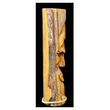 Tim Quinn Graphics - 2 Hand-Carved Wood Faces on Logs