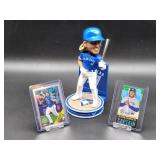 Vladimir Guerrero Bobblehead with a Limited 69/99 2021 Topps Baseball Card and a 2023 Topps Chrome Baseball Card