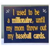 'I used to be a millionaire, until my mom threw out my baseball cards.' Wooden Sign
