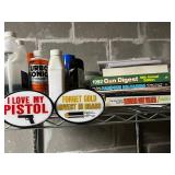 Vertical Metal Storage Rack w Contents Included! Gun Digest Books & Pistol Signs & More! Contents quantities unverified - 75' x 24'