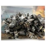 Bin of Multiple Turrets/Dies for Use With a Reloading Press for Ammunition