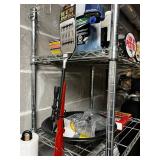 Vertical Metal Storage Rack w Contents Included! Gun Digest Books & Pistol Signs & More! Contents quantities unverified - 75' x 24'