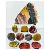 Mookaite Jasper is a unique Australian gemstone formed from ancient fossilized sea creatures that is prized by collectors for its vibrant, porcelain-like colors found in both raw slabs and smooth palm