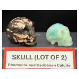Lot of 2 Hand-Carved Crystal Skulls: Rhodonite & Caribbean Calcite