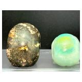 Lot of 2 Hand-Carved Crystal Skulls: Rhodonite & Caribbean Calcite