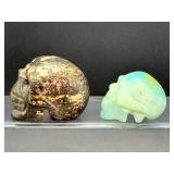 Lot of 2 Hand-Carved Crystal Skulls: Rhodonite & Caribbean Calcite