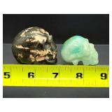 Lot of 2 Hand-Carved Crystal Skulls: Rhodonite & Caribbean Calcite