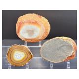Hand-Carved Agate Geode Candle Holder – Vibrant Red & Blue Banding. Polished Agate Trinket Dish – Warm Amber & Cream 'Fortification' Agate. Large Brazilian Agate Display Slab – Fiery Ora
