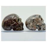 Rare 2pc Lot Hand-Carved Gemstone Skulls: Fluorescent Yooperlite & Vibrant Dragon’s Blood Jasper – UV Reactive Specimen Set