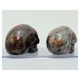 Rare 2pc Lot Hand-Carved Gemstone Skulls: Fluorescent Yooperlite & Vibrant Dragon’s Blood Jasper – UV Reactive Specimen Set