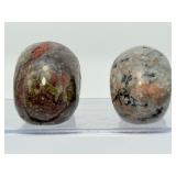 Rare 2pc Lot Hand-Carved Gemstone Skulls: Fluorescent Yooperlite & Vibrant Dragon’s Blood Jasper – UV Reactive Specimen Set