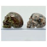 Rare 2pc Lot Hand-Carved Gemstone Skulls: Fluorescent Yooperlite & Vibrant Dragon’s Blood Jasper – UV Reactive Specimen Set