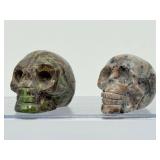 Rare 2pc Lot Hand-Carved Gemstone Skulls: Fluorescent Yooperlite & Vibrant Dragon’s Blood Jasper – UV Reactive Specimen Set