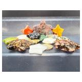 Exquisite Collection of  Masterfully Hand-Carved Natural Gemstone Stars: A  Specimen Set Featuring Rhodonite, Snowflake Obsidian, Jasper, and Rare Earth Minerals