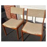 Two teak chairs by Dion