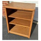 Oak stereo/book case cabinet on wheels with adjustable shelves