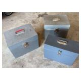 three metal file boxes