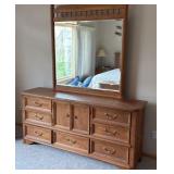 Thomasville Oak long dresser with great storage and mirror