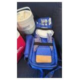 Great picnic collection with a picnic pack, an igloo cooler and a Coleman cooler