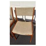 Two teak chairs by Dion