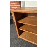 Oak stereo/book case cabinet on wheels with adjustable shelves