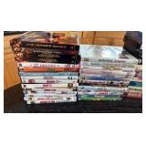 Assortment of kids, chick flick movies and VHS tapes